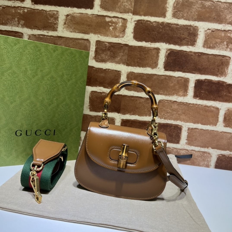 G*u*i top handle bags
